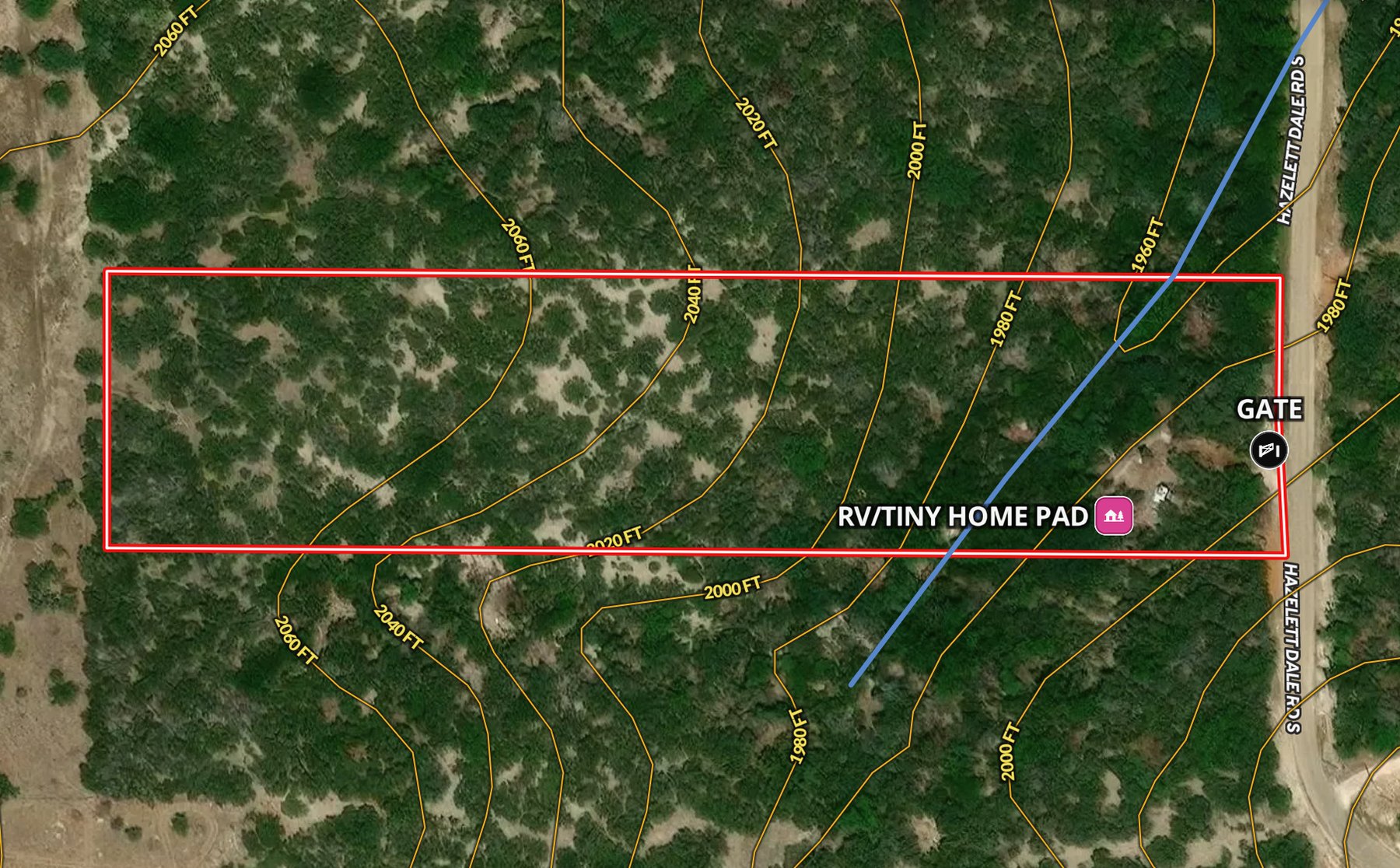Land id aerial map of 214 Hazelett Dale Rd, not a photograph: a red boundary line around the long rectangular tract over aerial imagery, with elevation contour lines, a blue creek line crossing the east end, Hazelett Dale Rd S along the east side, and the map&rsquo;s own labels GATE and RV/TINY HOME PAD